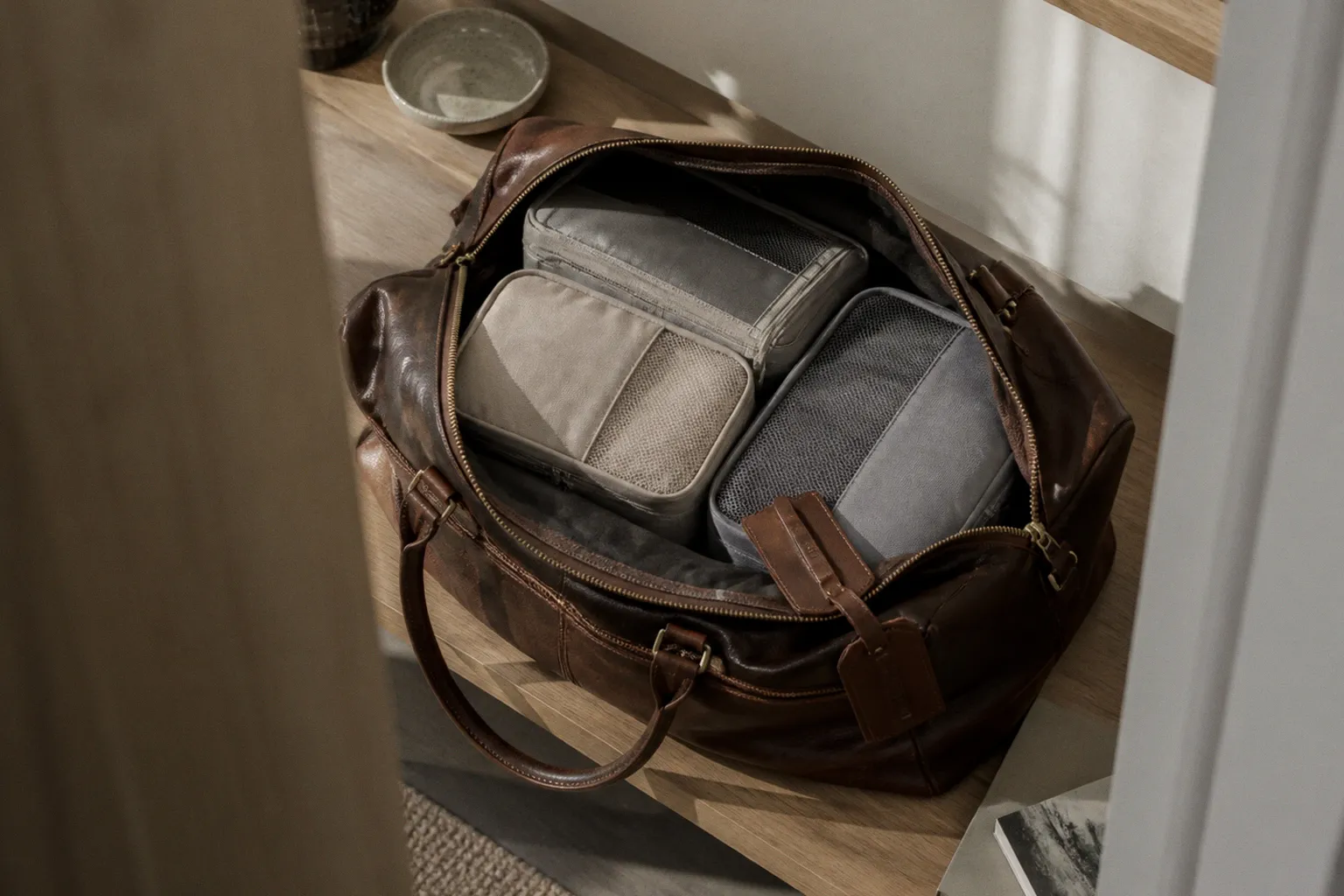 Sac week-end en cuir : l'effet des organiseurs de bagage